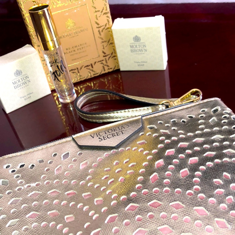 24 K Gold Lipgloss w/-Victoria’s Secret Wristlet